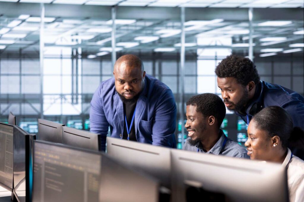 Nigerian youth in collaborative workspace developing professional skills (investment for nigerian youth)