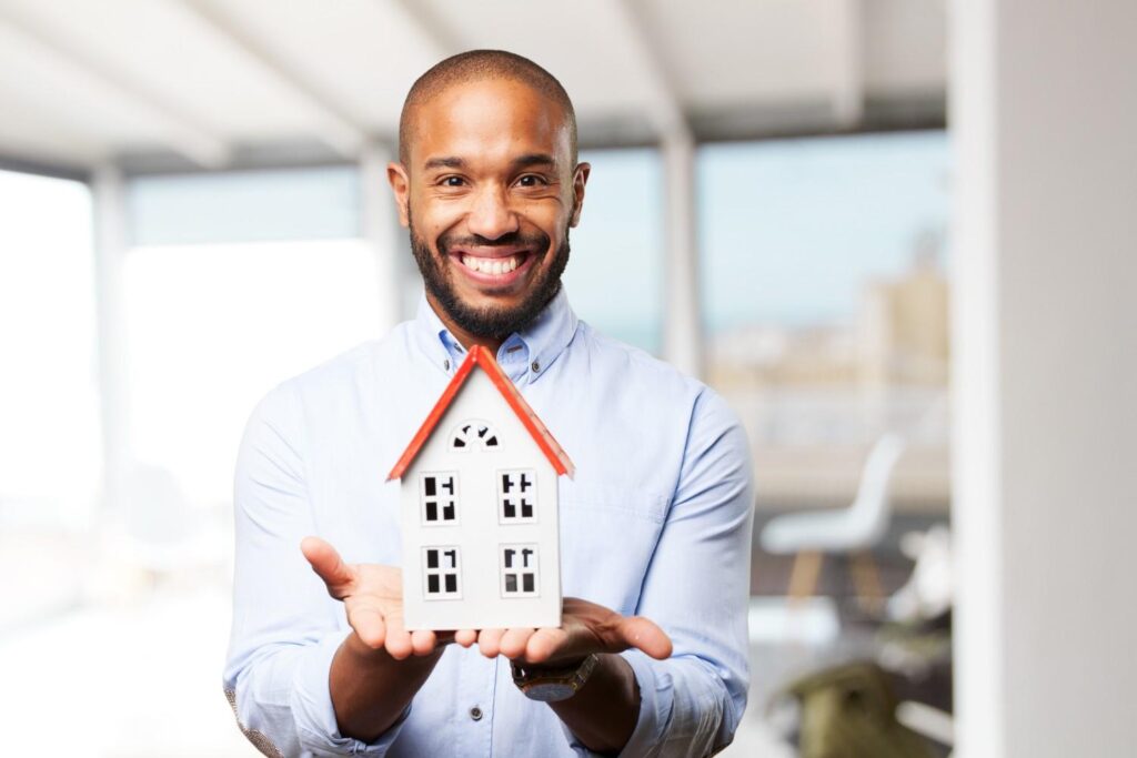 Young real estate agent with the expression of fulfilment of a real Profitable Business Ideas in Nigeria for 2025