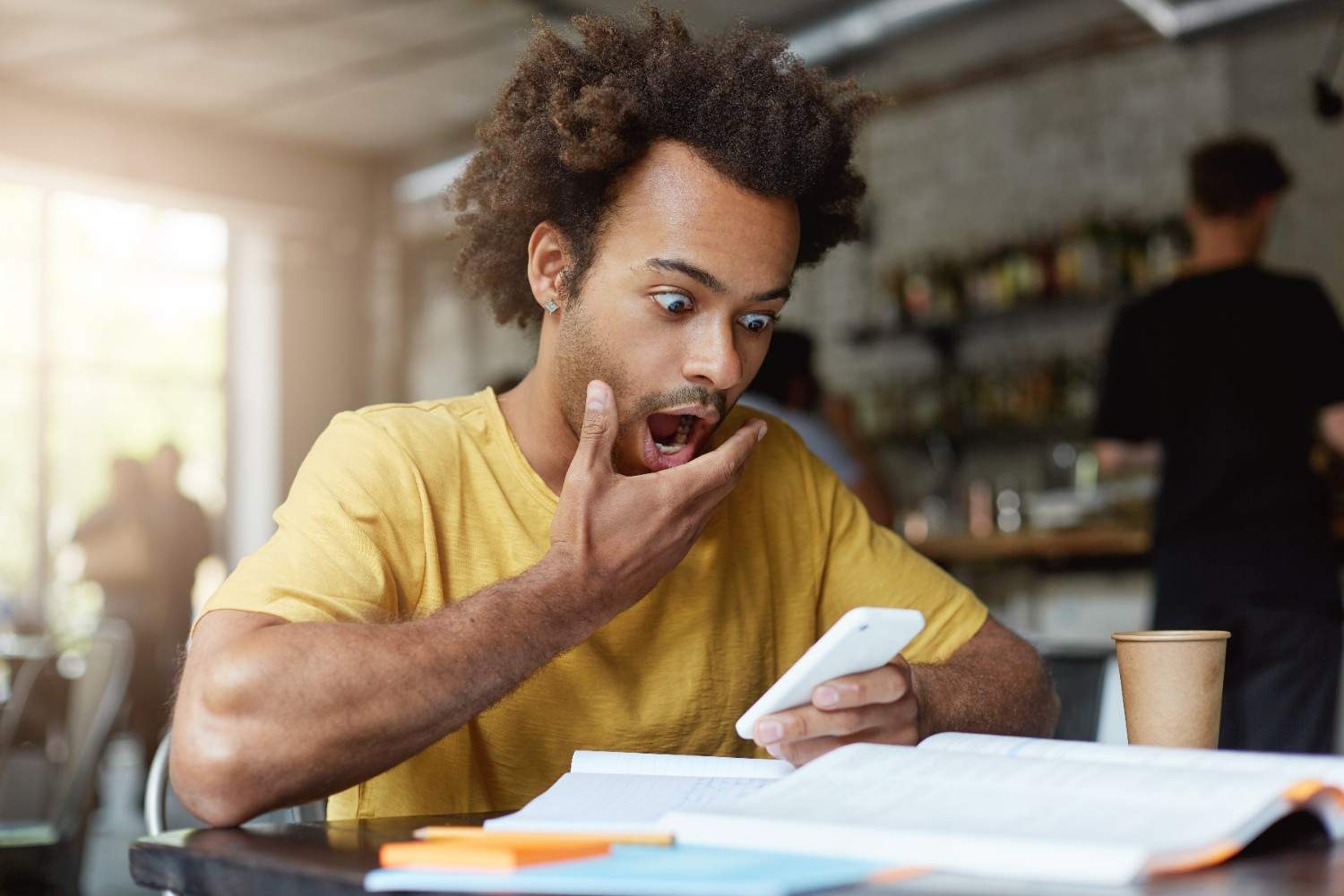 young student checking scholarship acceptance mail